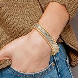 "Sette" Set of 7 Stackable 14K Yellow Gold Slip On Bangle Bracelets