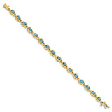 Swiss Blue Topaz Bracelet Bezel Set Oval in 14K Yellow Gold