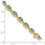 Swiss Blue Topaz Bracelet Bezel Set Oval in 14K Yellow Gold