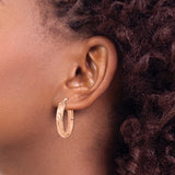 Twisted Oval Hoop Earrings in 14K Yellow Gold